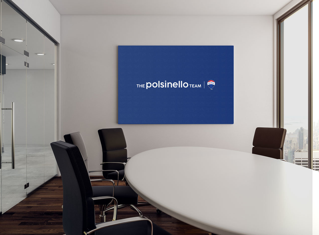 Office boardroom with Polsinello Team logo